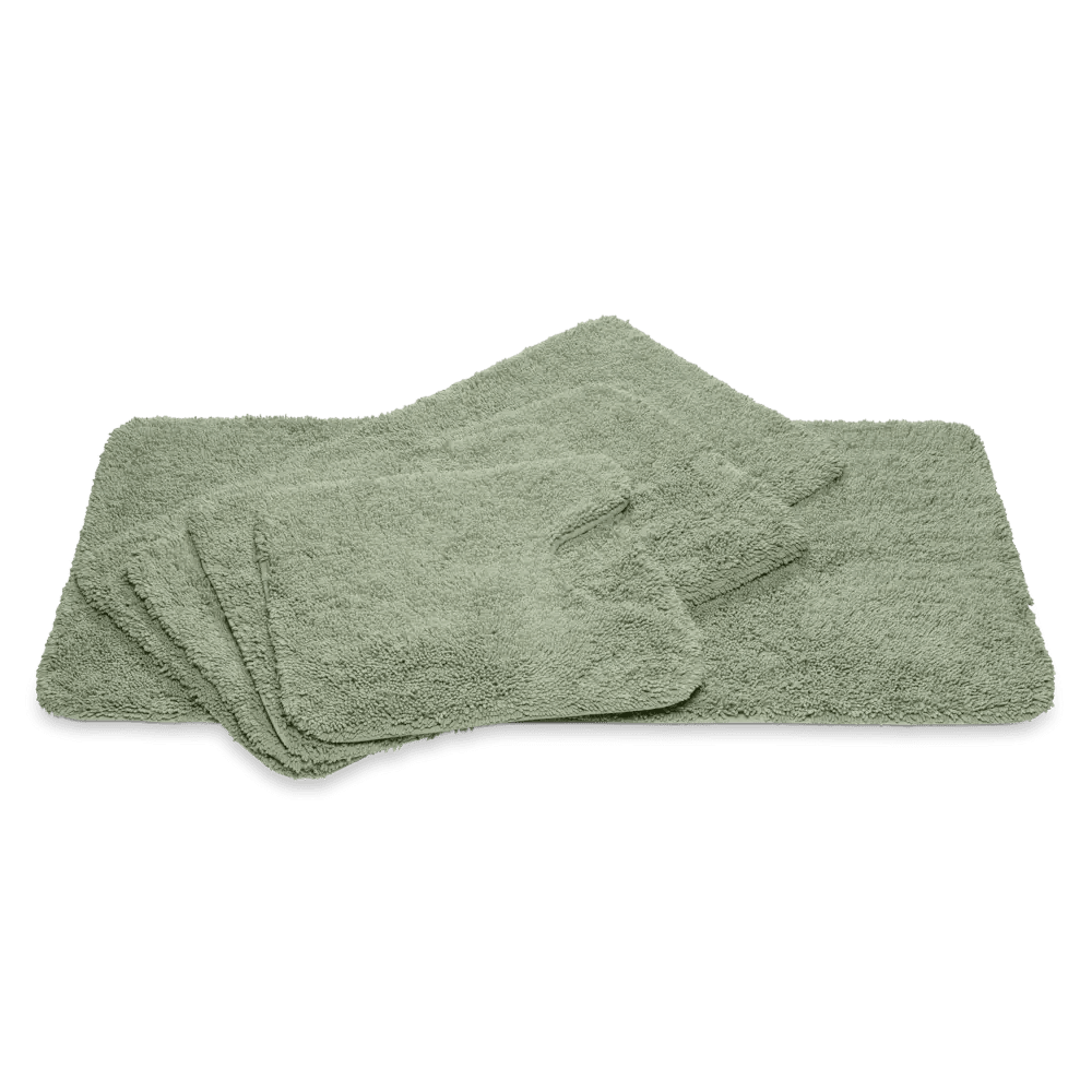 Weicher Badteppich Ranger in Smoke Green Rauchgrün von Vandyck mit Schlingenoptik und rutschfester Unterseite für ein modernes Badezimmer.