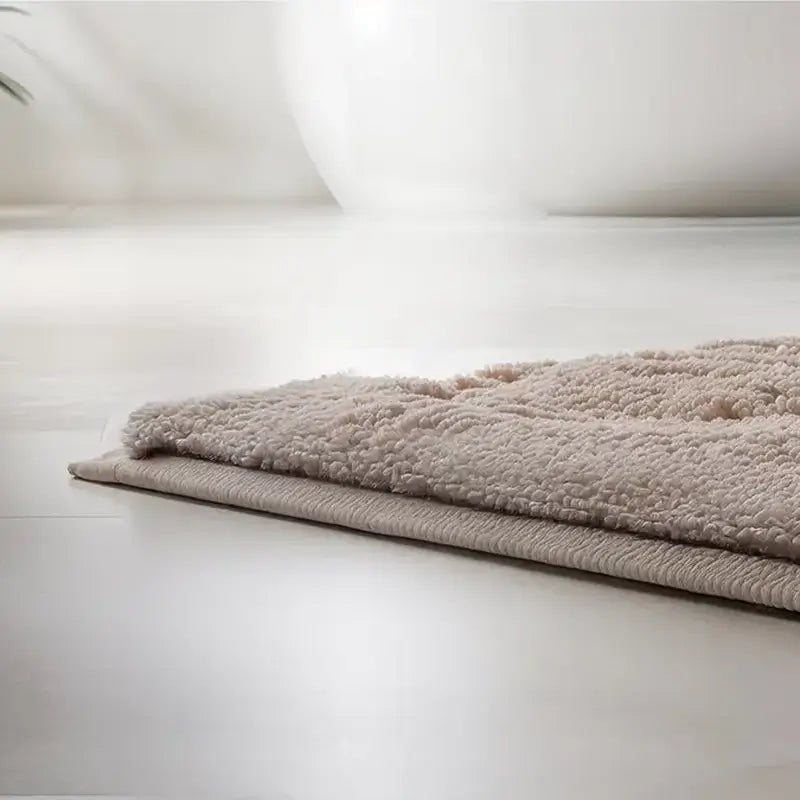 Badteppich Ferya in Beige – weiche Badematte mit Hoch-Tief-Muster