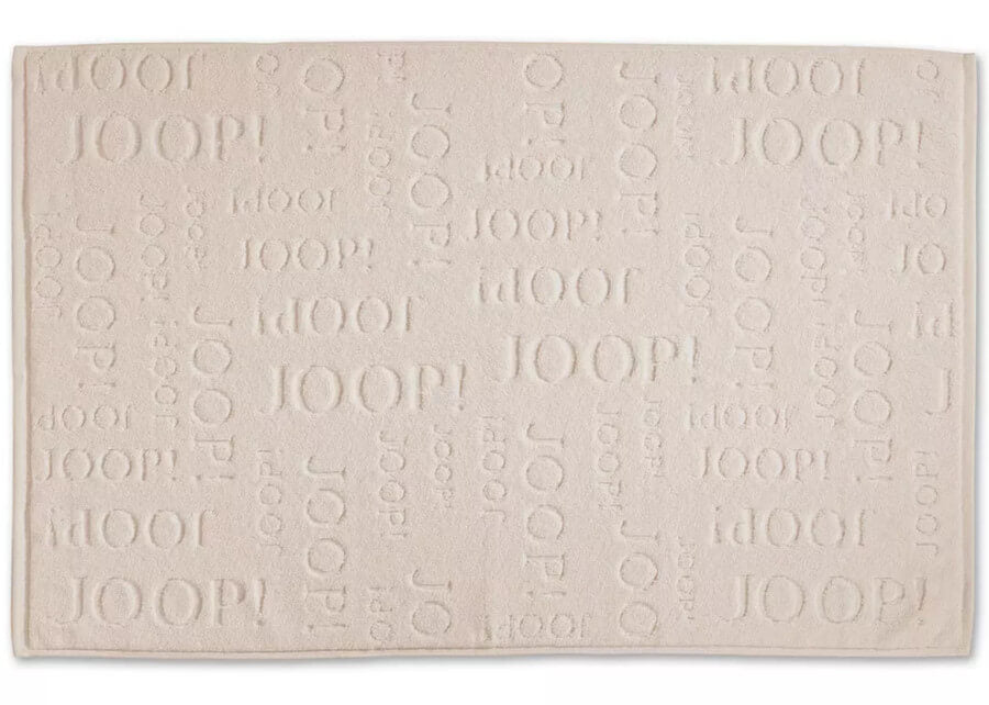 Badvorleger aus Baumwolle in Sand: Der moderne, saugfähige und pflegeleichte Badvorleger "Joop Repeat" in Sand ist ein stilvolles Badaccessoire.