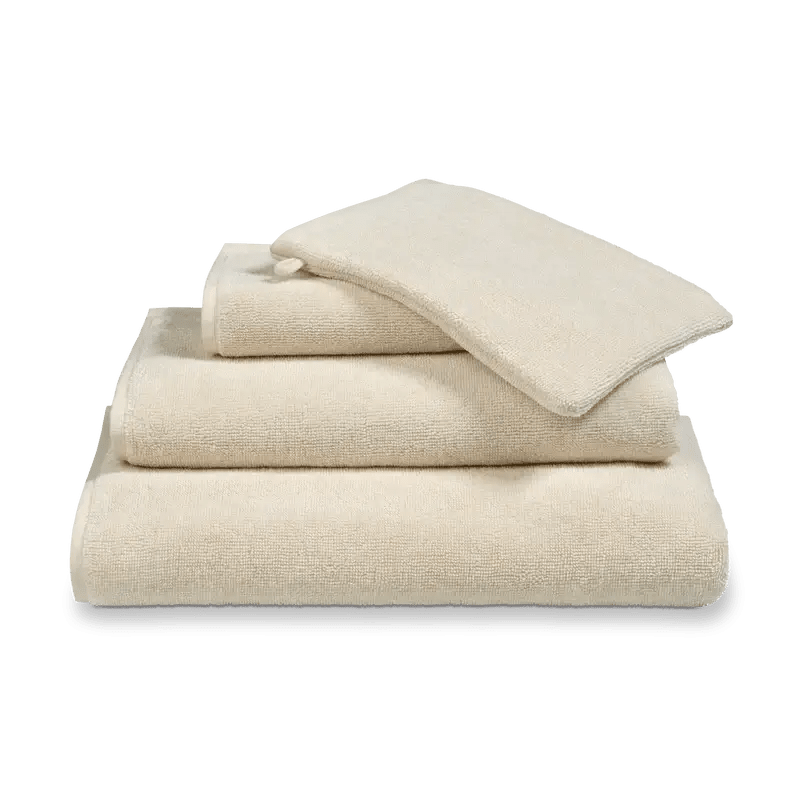 Handtuch Verona in Desert Beige Creme von Vandyck aus saugstarker Baumwolle für ein stilvolles Badezimmer.