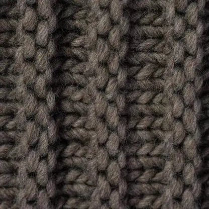 Dunkelbraunes Strickplaid Bergen aus Wolle – weiche und gemütliche Wolldecke für ein stilvolles Zuhause.